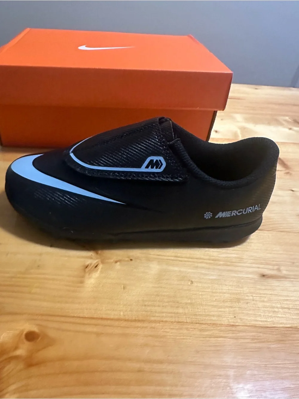 Nike Kids Black Sneakers with White Swoosh